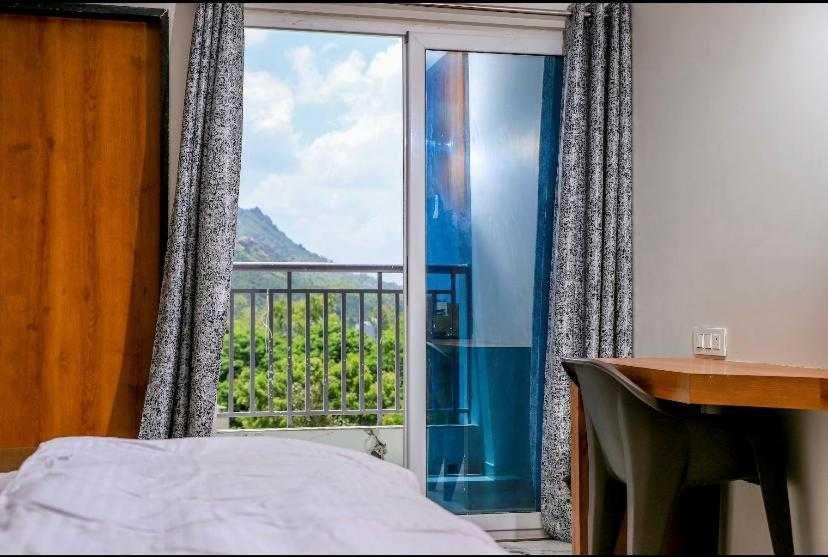 Super Townhouse Ambaji Formerly Hotel Kardhar Inn Exterior foto